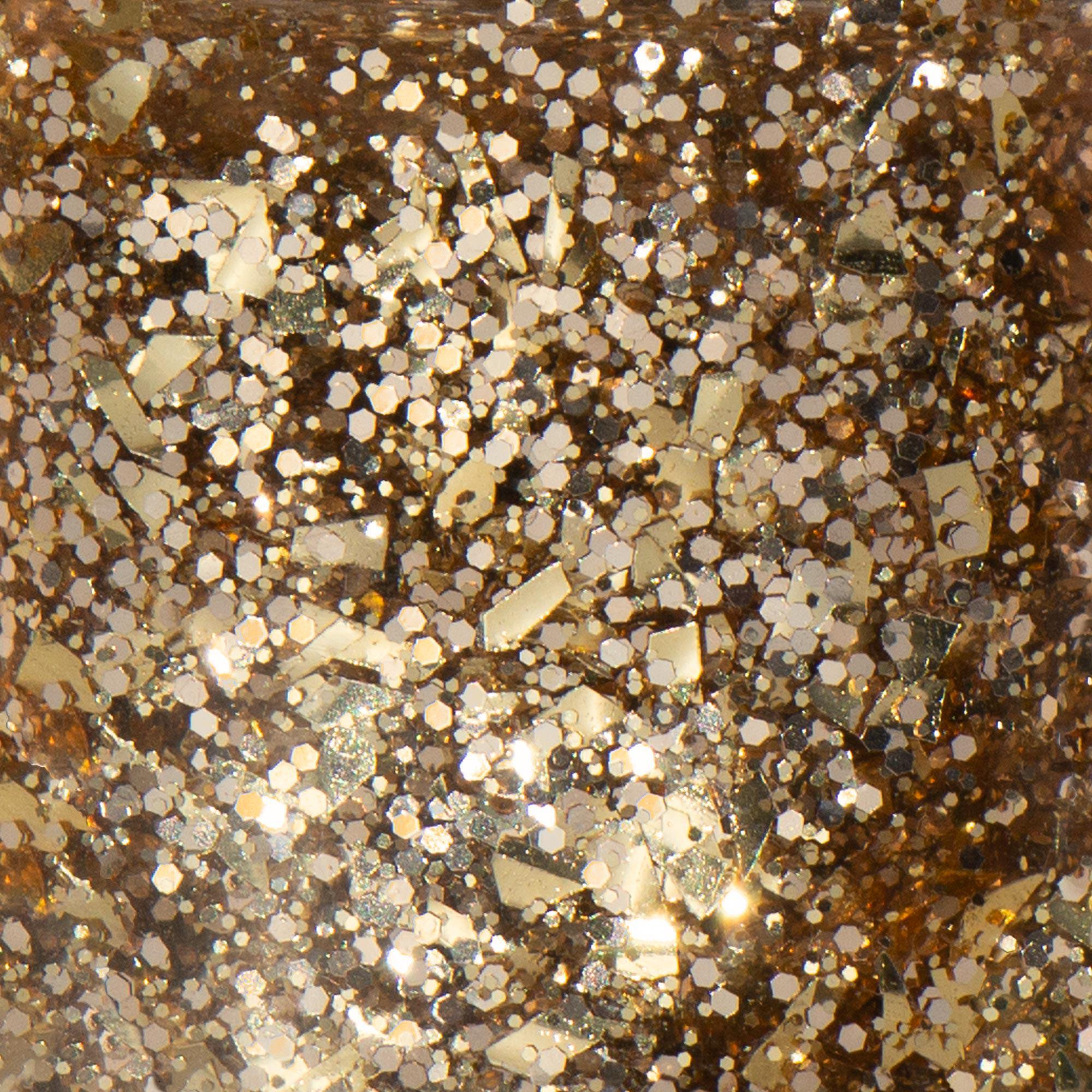 Macro view of BKIND 24K gold glitter polish β Calgary nail polish with bold shimmer and sparkling metallic flakes.
