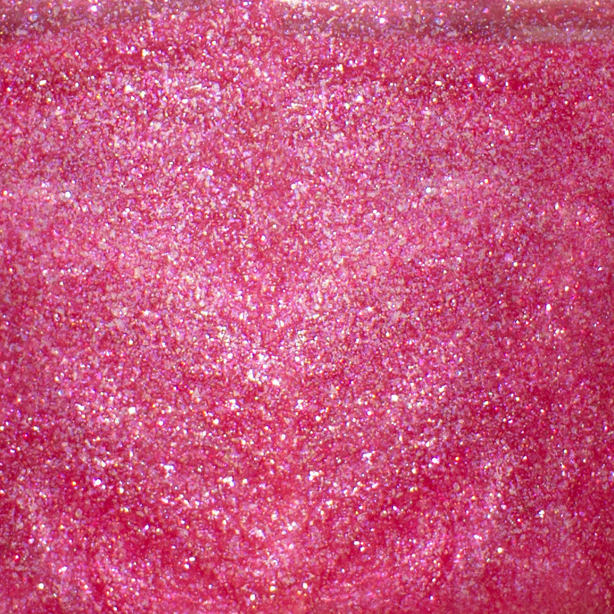 Close-up of BKIND Britney glitter pink nail polish swatch – Calgary non-toxic nail polish