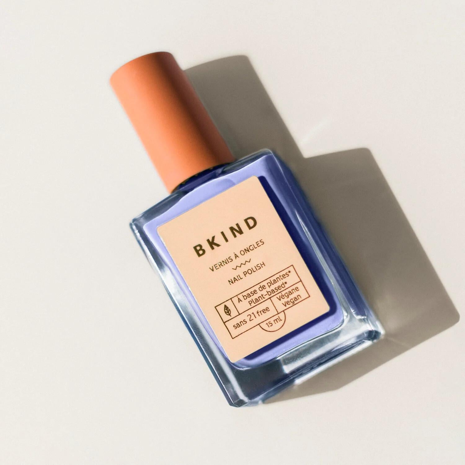 BKIND Aquarius vegan nail polish – Calgary clean beauty in a bold lilac blue shade for eco-conscious manicures.
