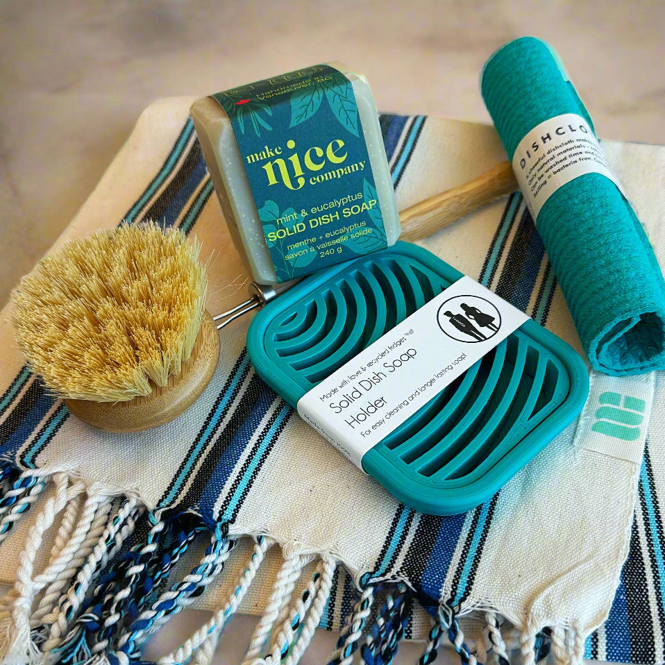 Calgary zero waste kitchen gift set with solid dish soap, eco brush, Swedish cloth, and recycled soap dish.