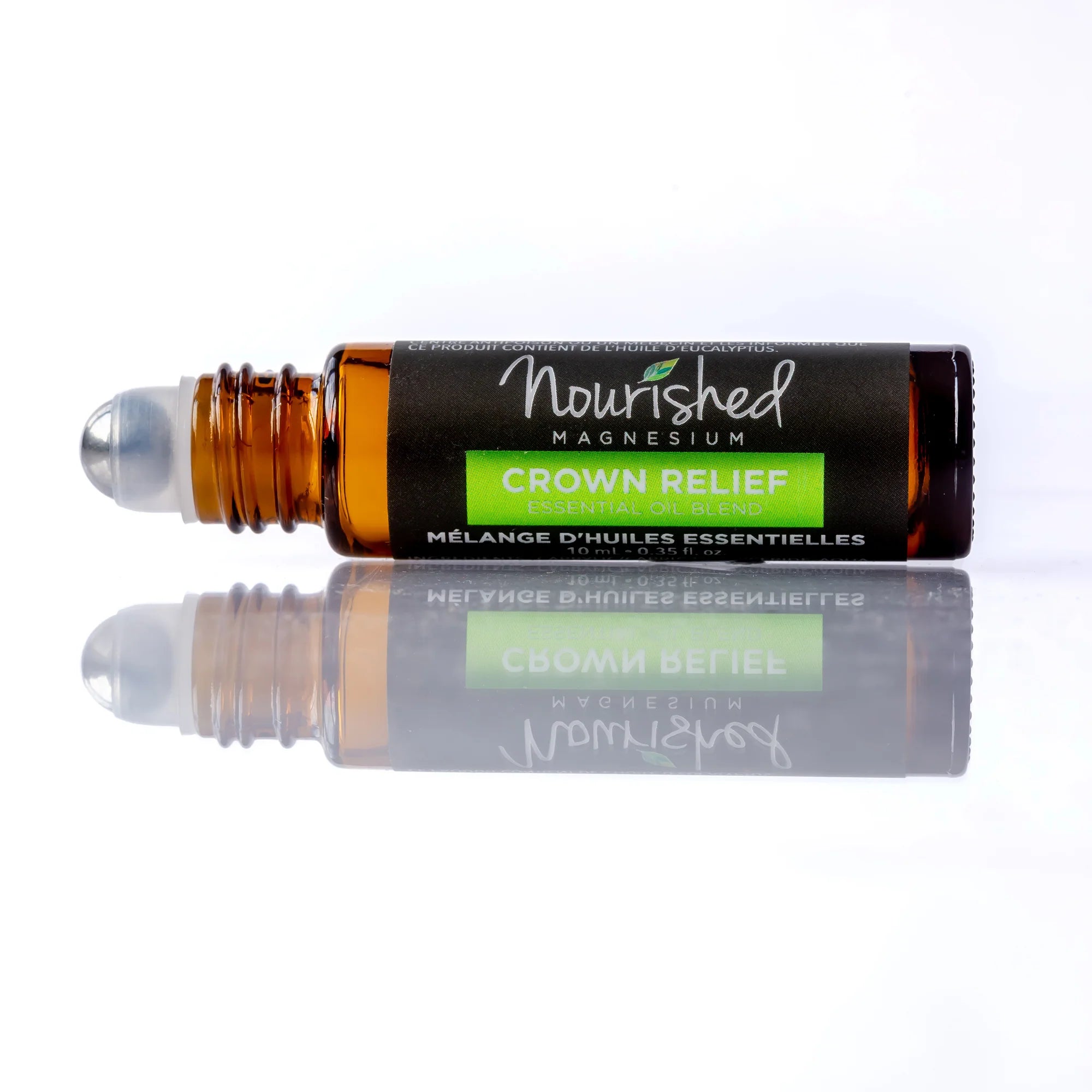 Open roll-on applicator of Crown Relief magnesium essential oil roller, showing stainless steel ball tip on white background