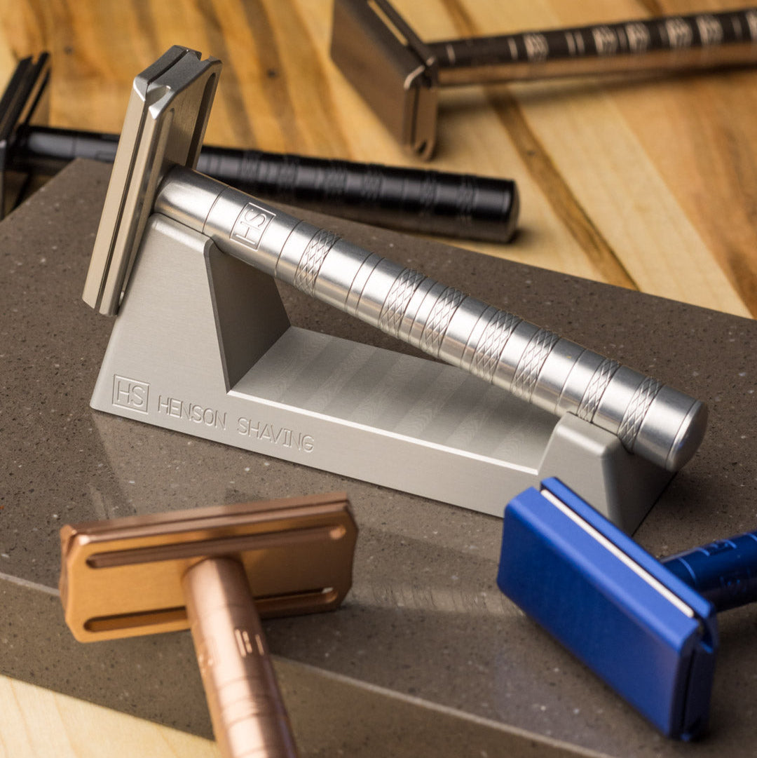 Safety razors in multiple colours with stand on wood counter – Calgary shaving essentials at Greenbriar Market