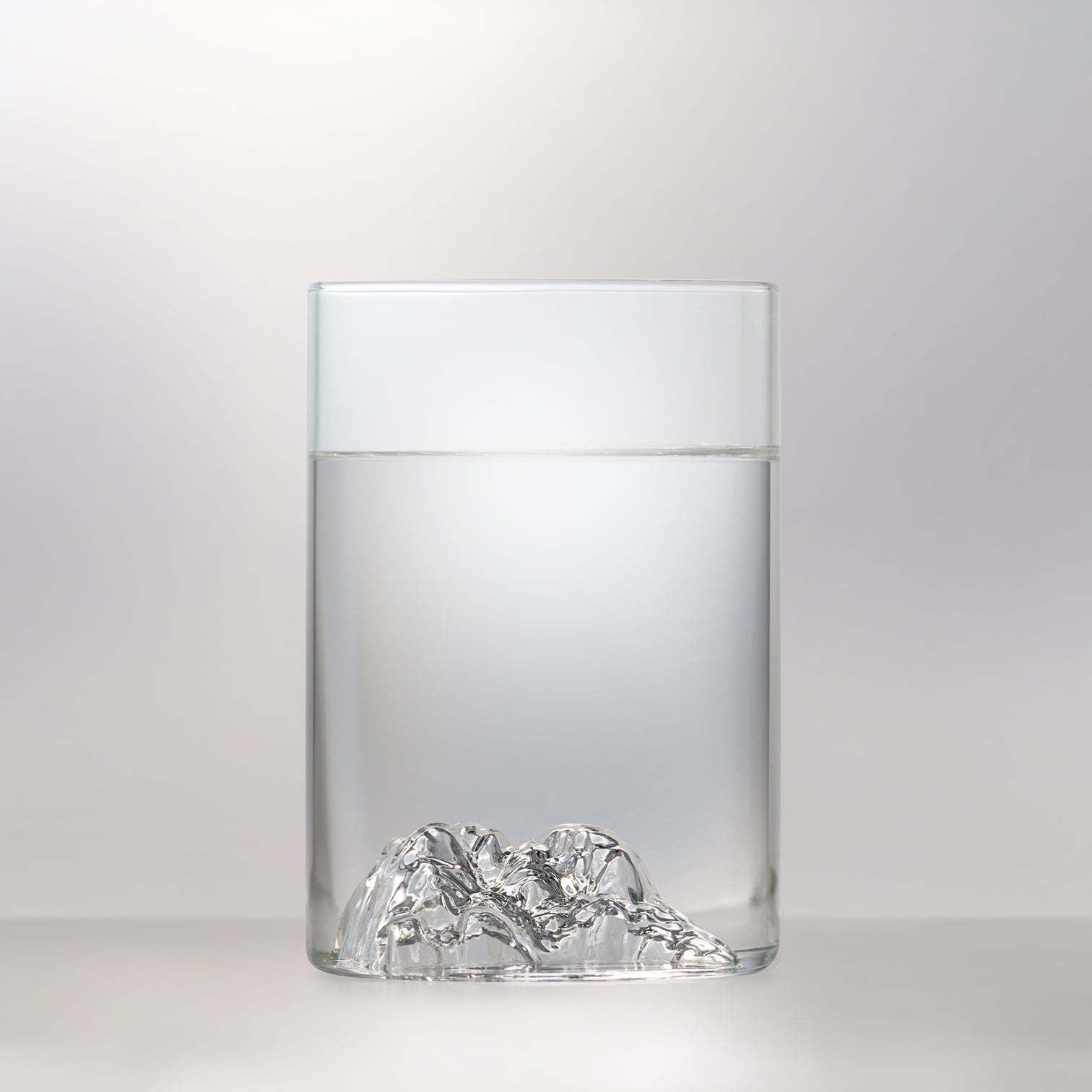 Front view of Squamish pint glass by MTNPK with clear liquid, available at Greenbriar Market in Calgary