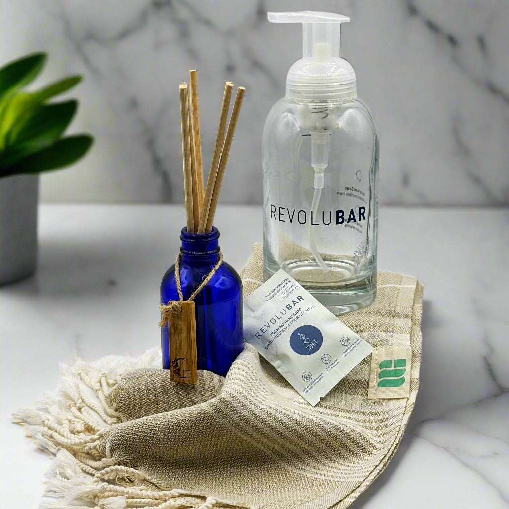 Calgary gift set with foaming soap bottle, reed diffuser, and Turkish towel—perfect for guest-ready powder rooms.