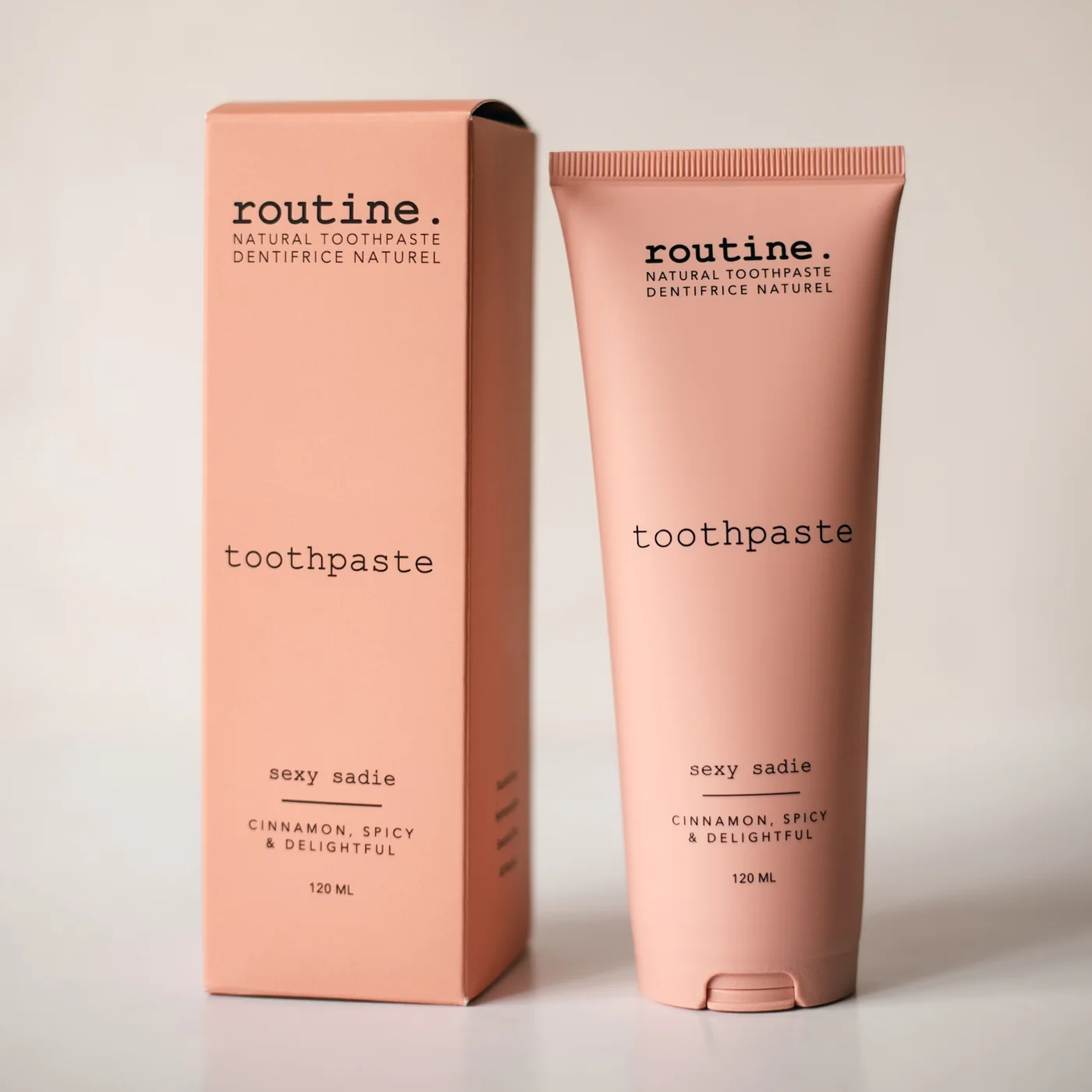 Routine Cinnamon Toothpaste and box, sustainable oral care made in Calgary