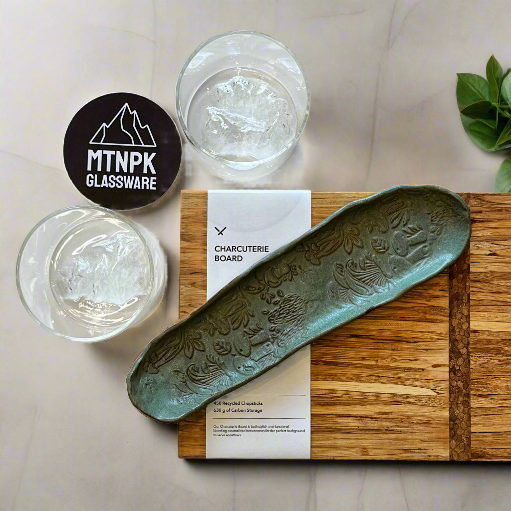 Calgary gift set with charcuterie board, Alberta mountain glassware, and handmade olive dish for easy hosting.