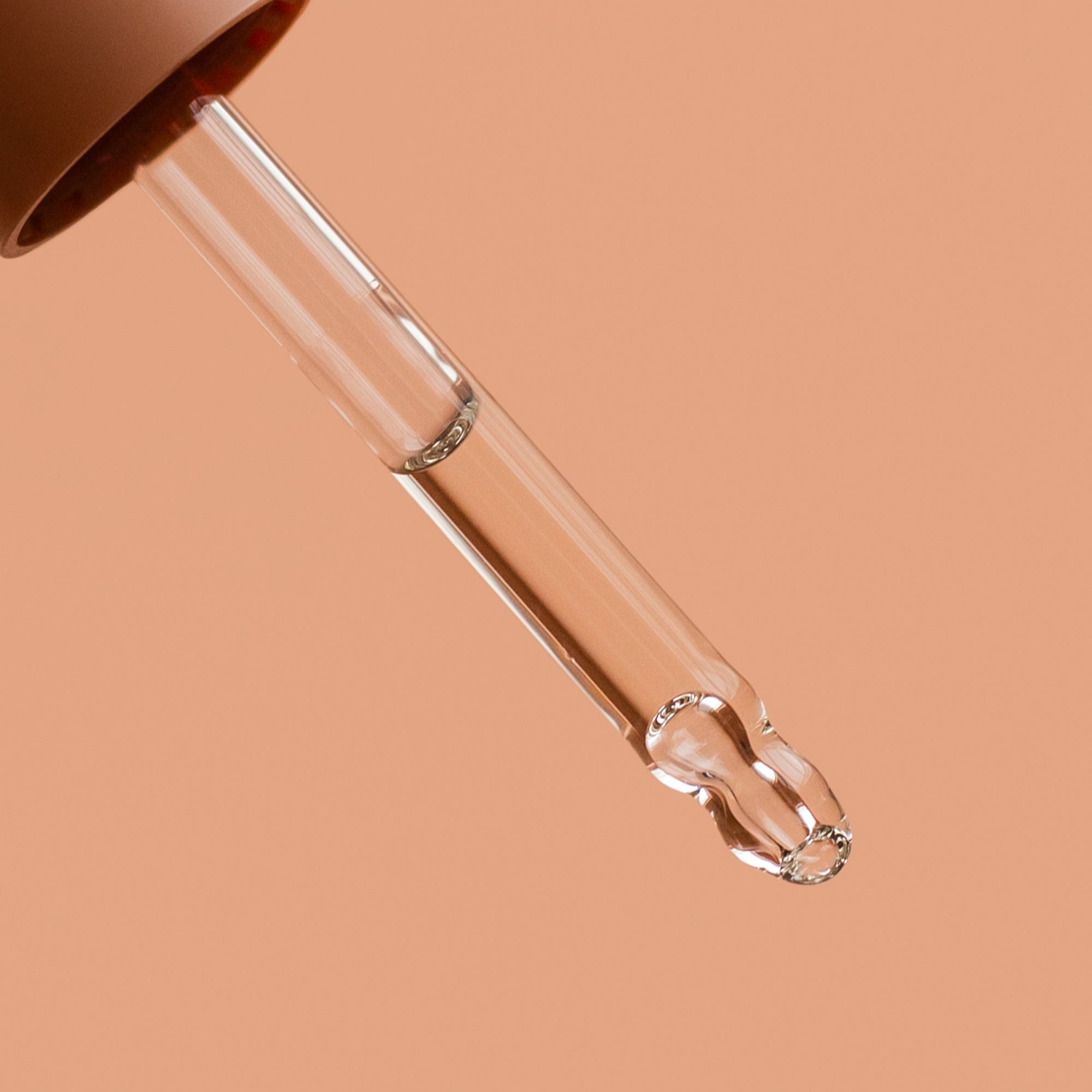 Detail of cuticle oil dropper with serum – Calgary skincare essentials for hydrated nails and healthy cuticles.