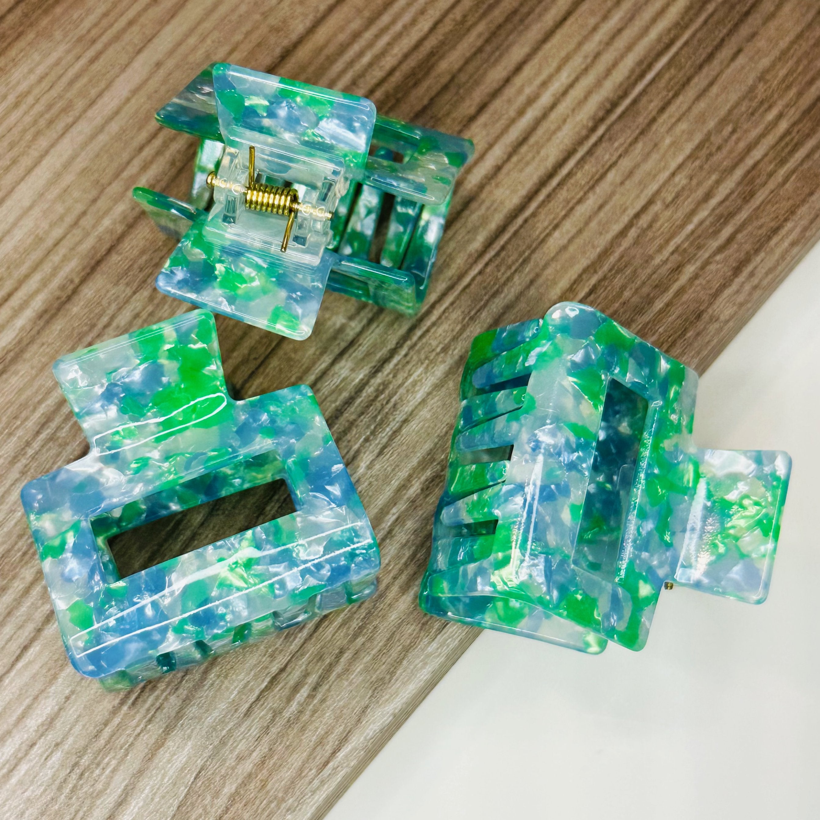 Blue and green marbled Evelyn hair clip – cellulose acetate accessory by Sebeana, available at Greenbriar Market in Calgary