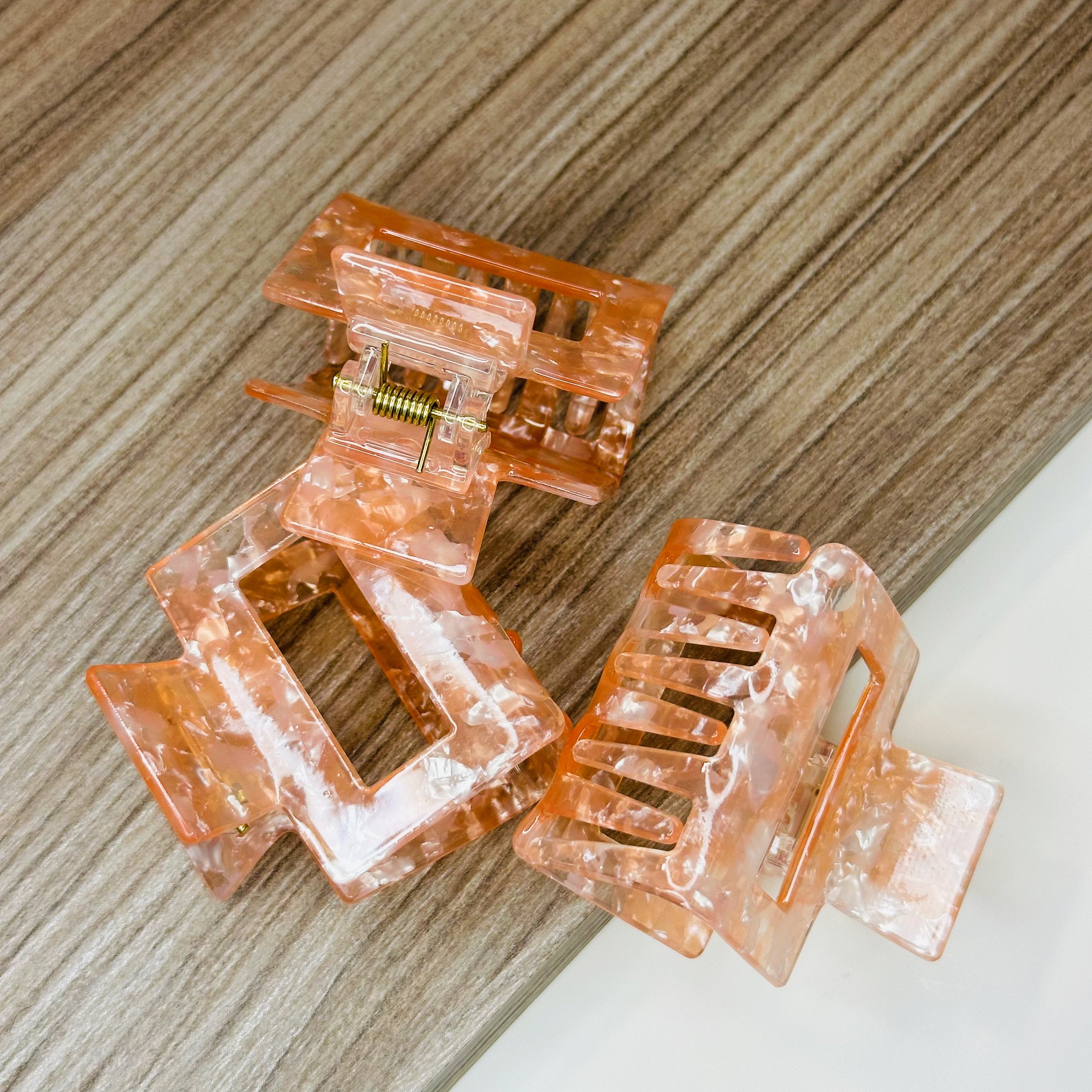 Peach marbled Evelyn hair clip – cellulose acetate accessory by Sebeana, available at Greenbriar Market in Calgary
