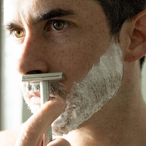 Man shaving with Henson AL13 safety razor – best razor in Calgary for smooth skin