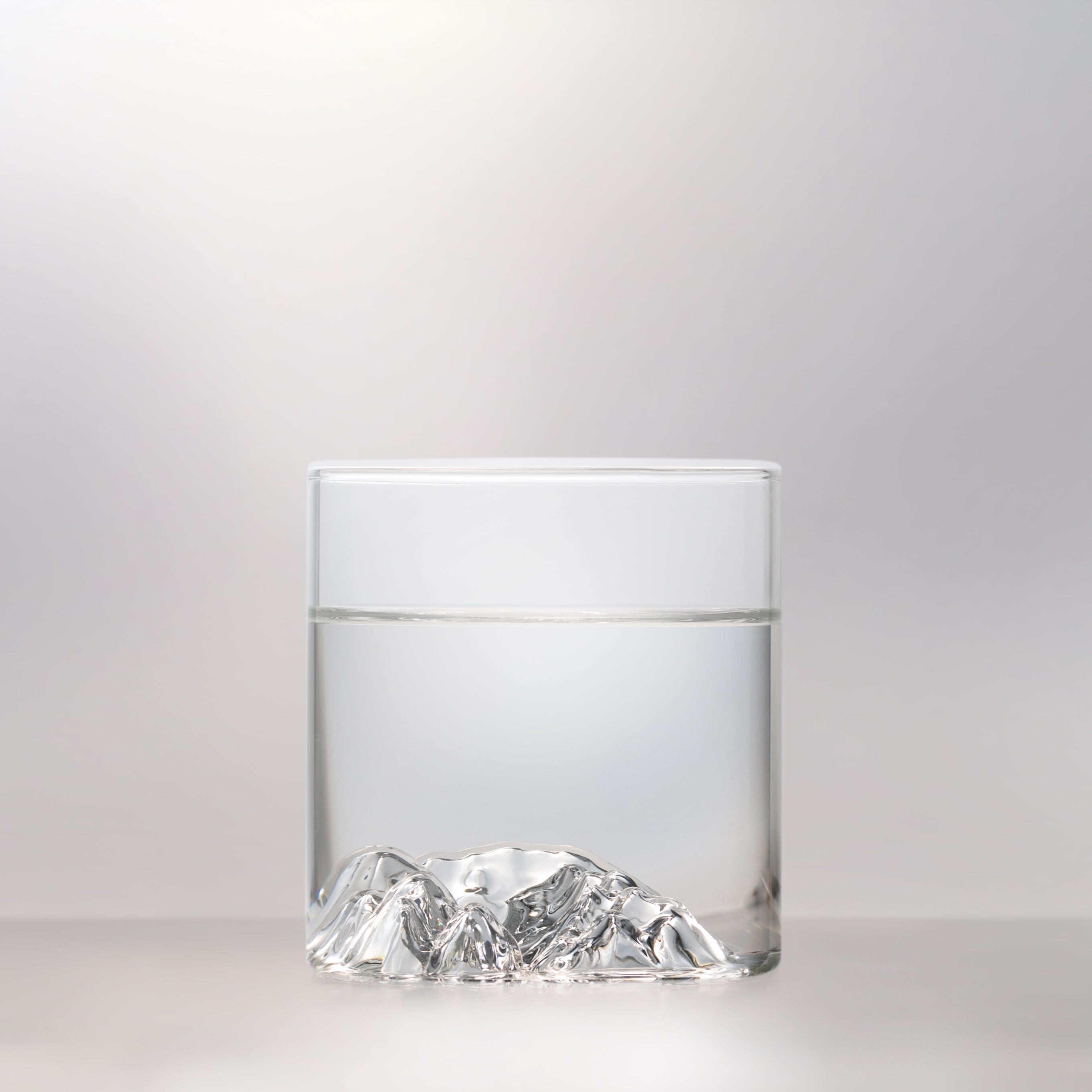 Lake Louise 12oz tumbler glass with 3D mountain detail on white background, available at Greenbriar Market in Calgary