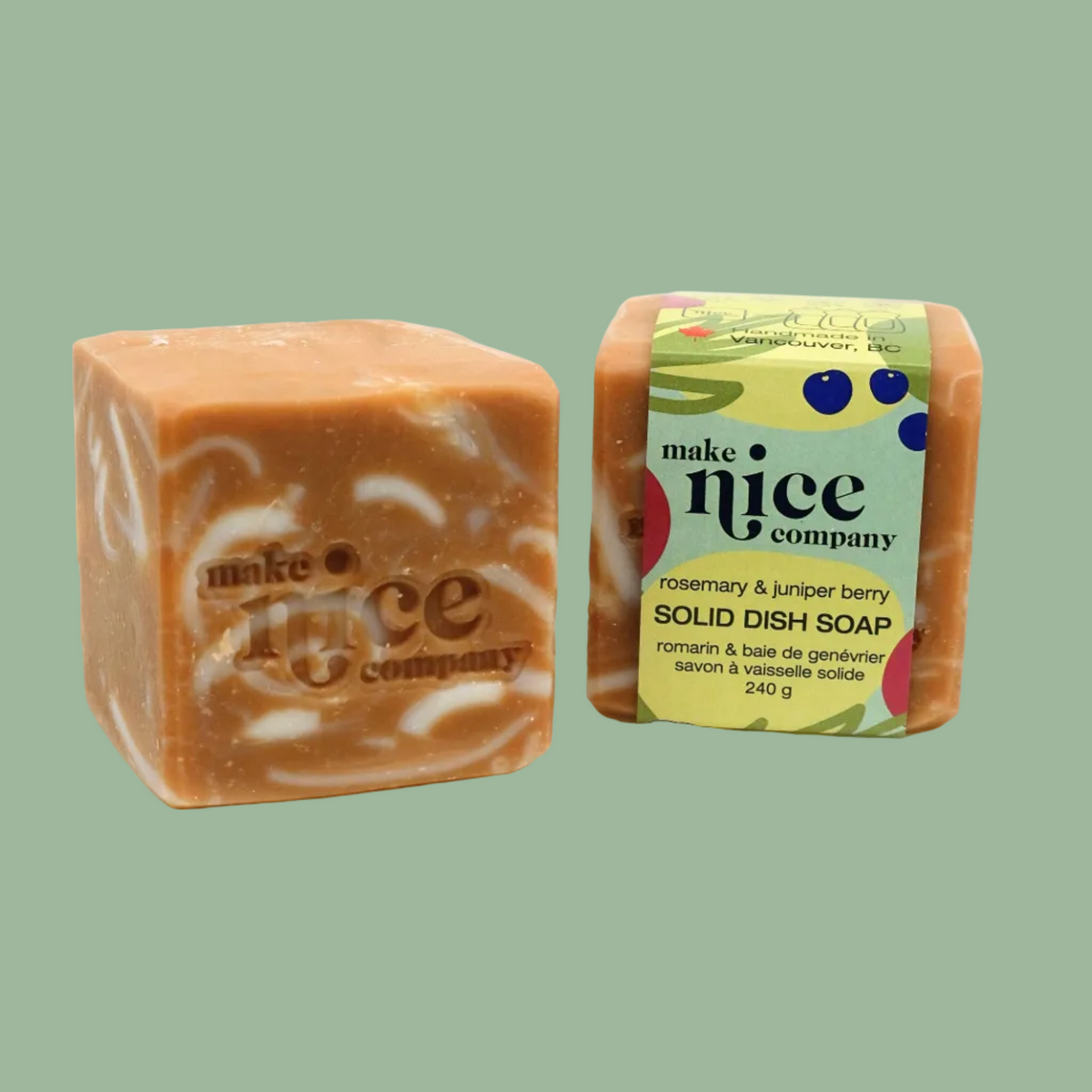 Unwrapped and packaged Make Nice Company Rosemary + Juniper Solid Dish Soap, a swirled embossed bar, Calgary zero waste
