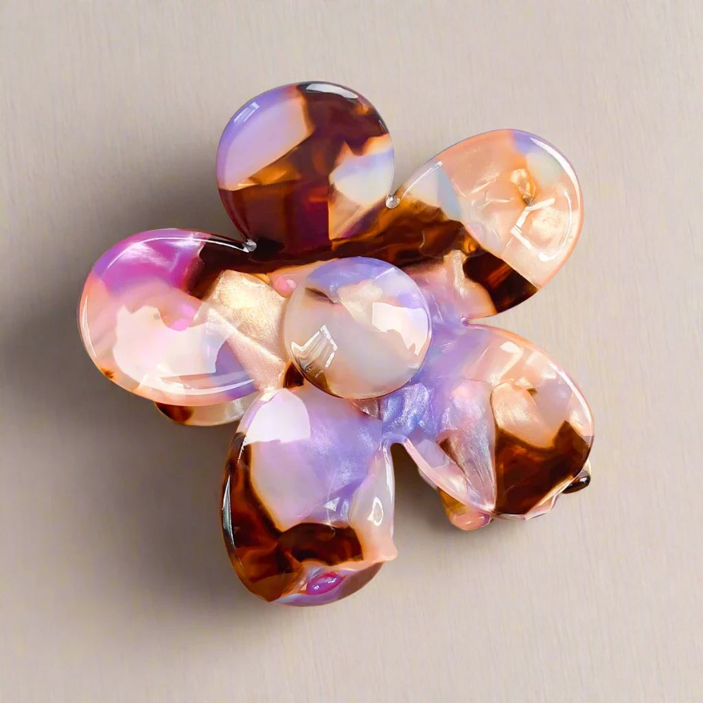 Lilac and chocolate daisy hair clip on neutral wood – Calgary sustainable hair accessories by Sebeana