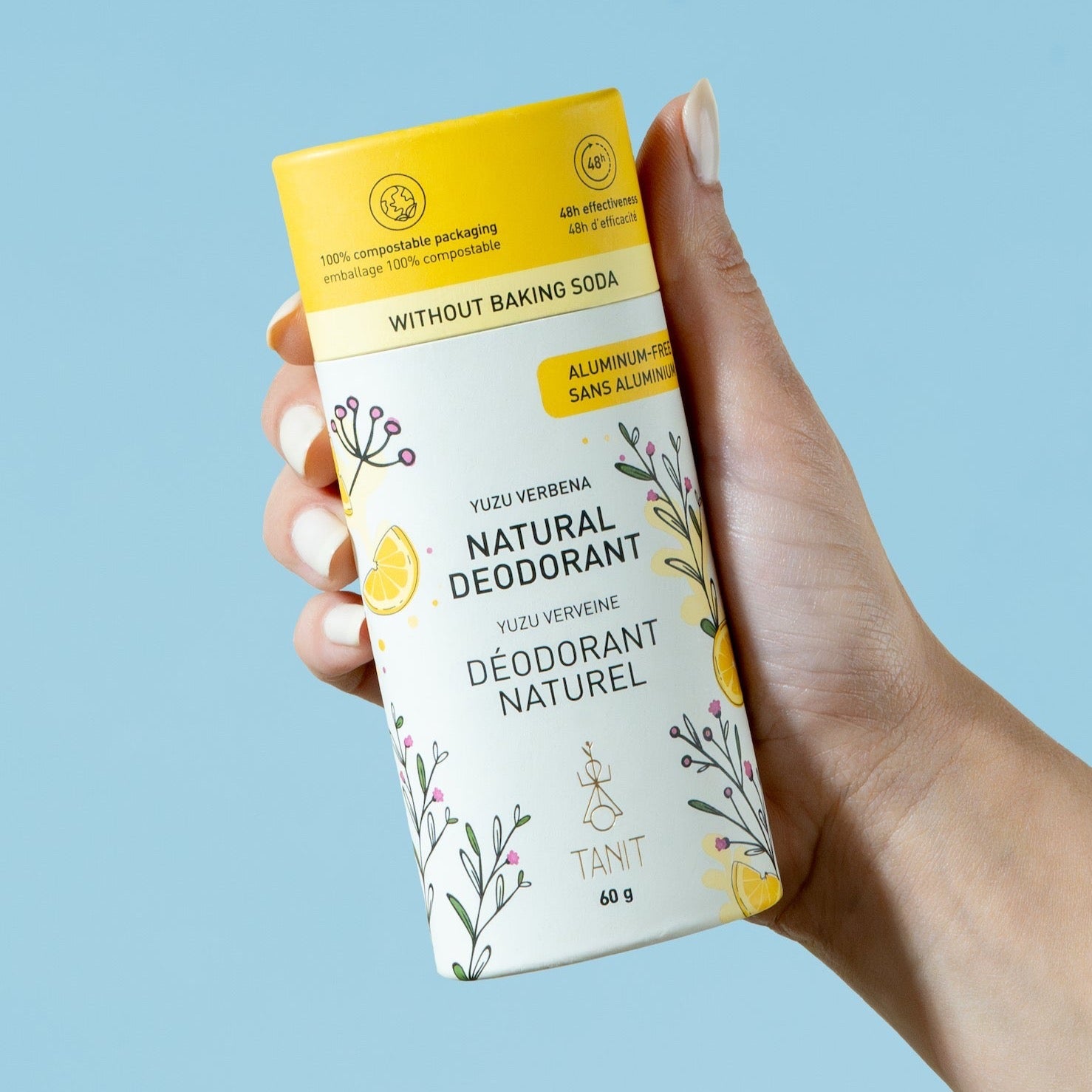 Aluminum-free natural deodorant in Yuzu Verbena scent held in hand, perfect for sensitive skin and low-waste living in Calgary